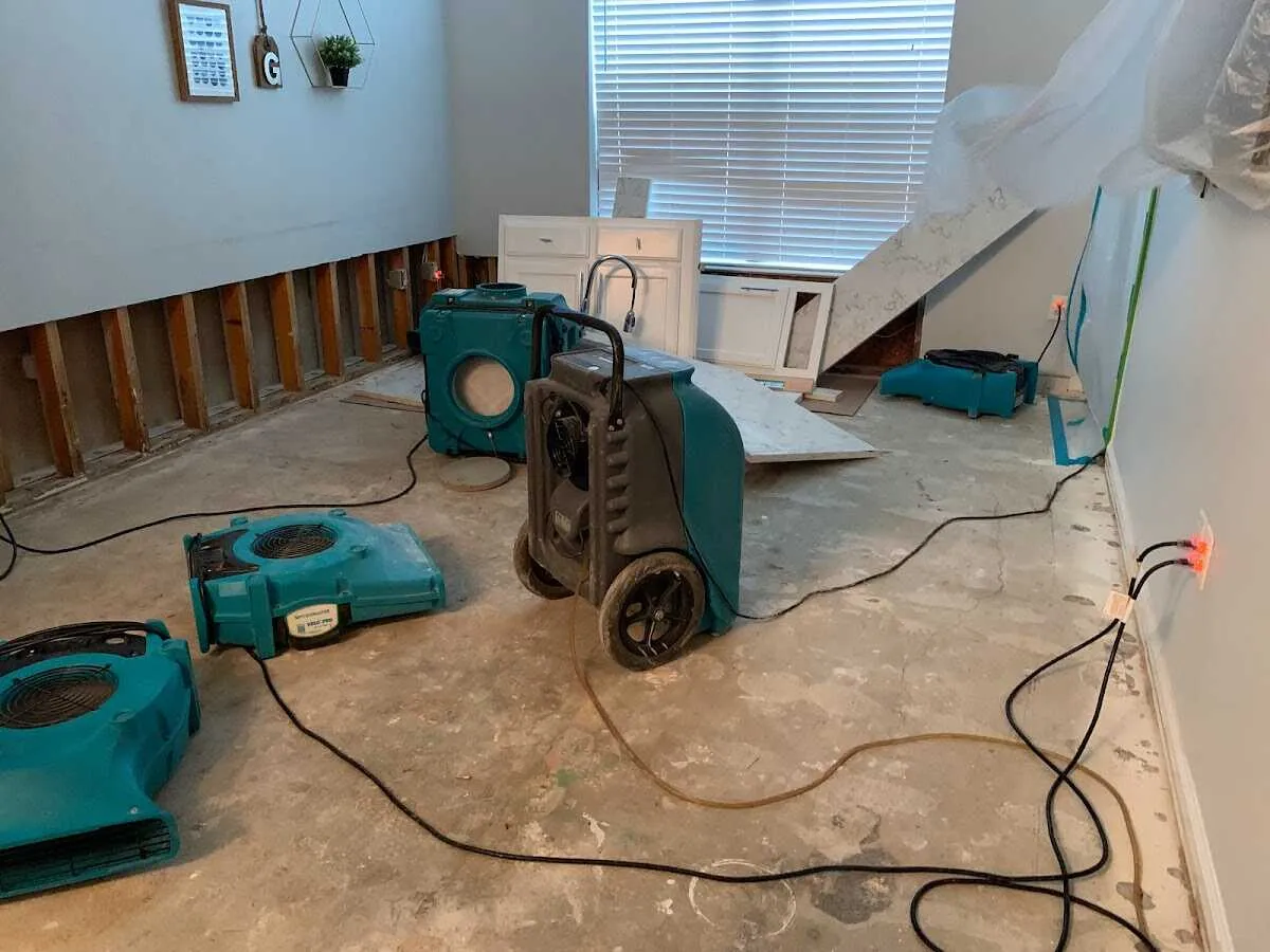 Dehumidifier in flood-cut room for Water Damage Restoration in Windsor